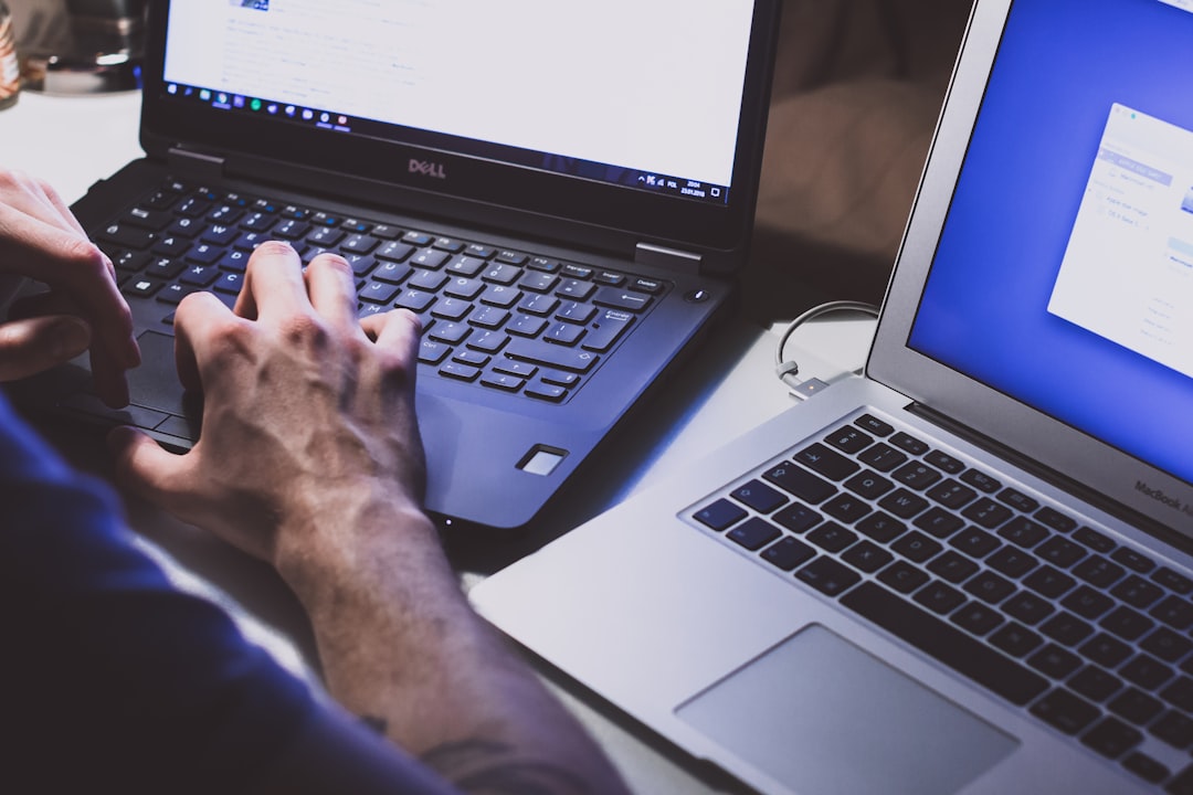 Person using laptop with digital privacy security icons and lock symbols
