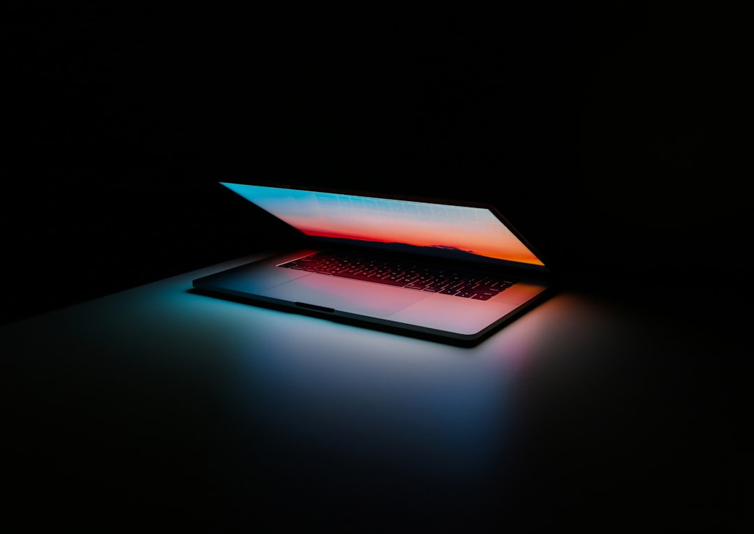 Digital professional working securely on laptop with privacy protection enabled